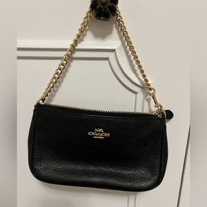 Coach Nolita 19 in black with gold tone chain handle